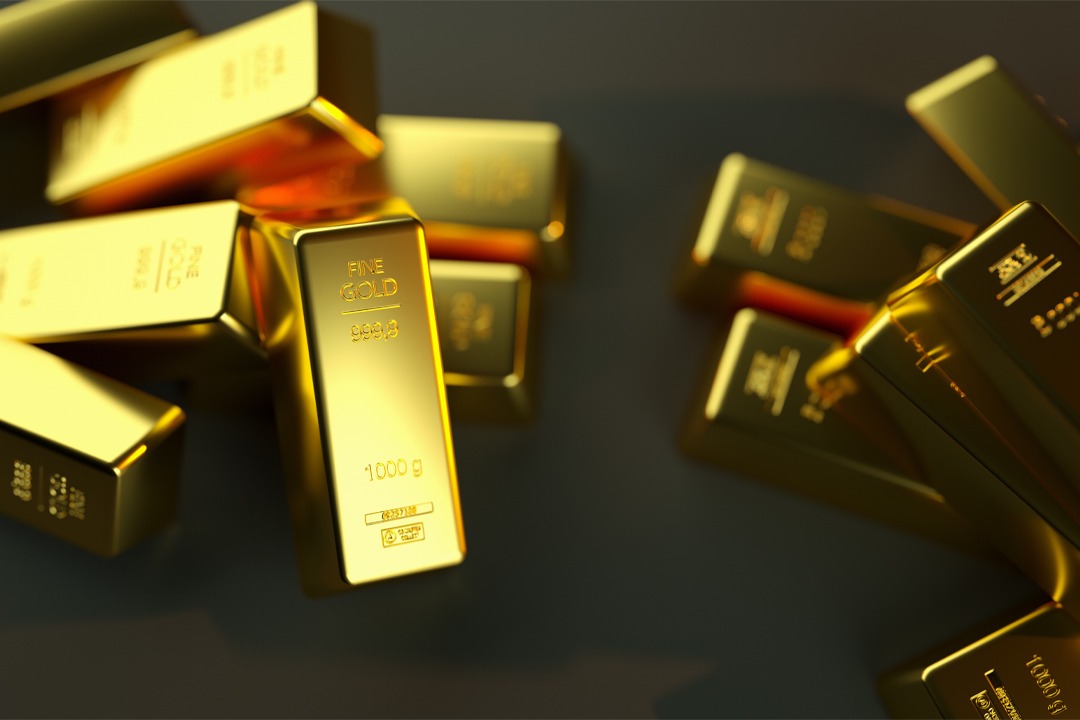 closeup-shot-of-gold-bullions-on-a-black-backgroun; Der Reichtum, Reichtum im Feng Shui; Wohlstand, Fülle, Geldsektor; Geldbereich